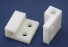 Milling, Drilling & Tapping of a Nylon Roller Adjustment Block Milling, Drilling & Tapping of a Nylon Roller Adjustment Block